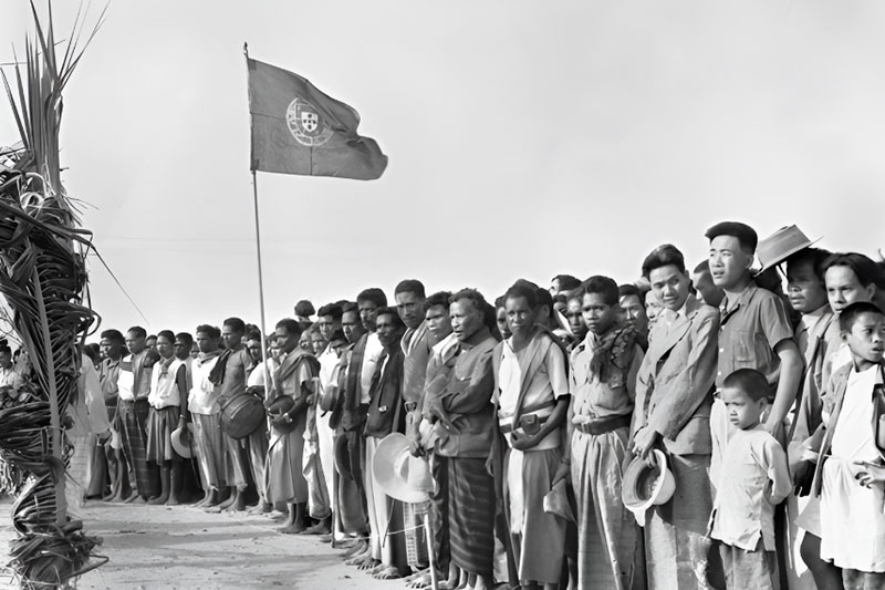 Locals in Portuguese Timor welcome a small party of Australian soldiers, led by Brigadier Dyke DSO, Commander of Timor Force in 1945. 